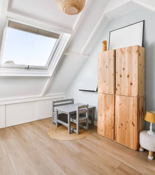 attic-room-with-wooden-floor-and-skylight-2023-11-27-05-00-11-utc